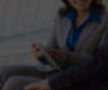 Blurred photo of change practitioner using iPad